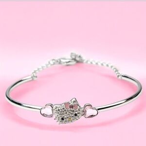 Hello Kitty Sanrio Silver Bracelet with Heart Accents.